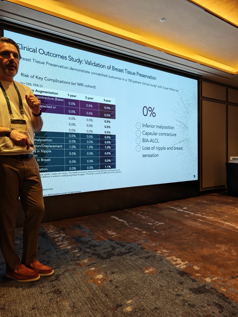 A speaker presenting clinical outcome data on a large screen during the Motiva Preservé Roundtable in Seoul
